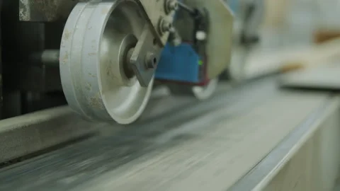 Automatic Industrial Wood Cutting Machine with Feeding Roller Stock Footage 332304643