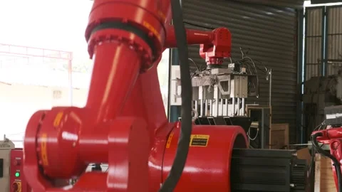 Automatic industry robot arm working in manufacturing plant. Stock Footage 183444825
