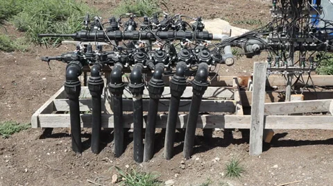 Automatic irrigation system with tubes and solenoids valves Video stock 39014186