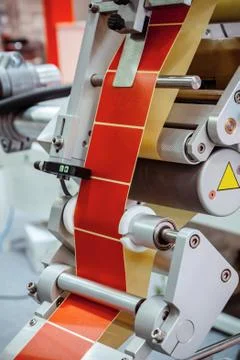 Automatic labeling machine. Stock Photos
