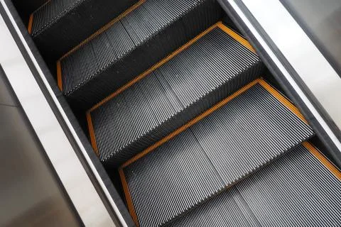 Automatic ladder escalator view from above top Stock Photos