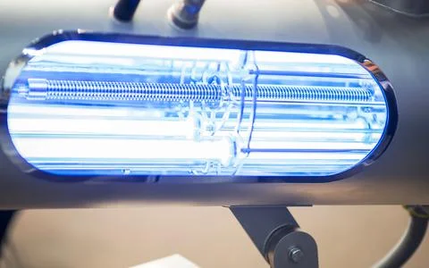 Automatic laser machine gun, filled with blue light smart science background Stock Photos
