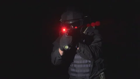 Automatic with laser sight. The soldier holds a laser sight on the target Видео 96715009