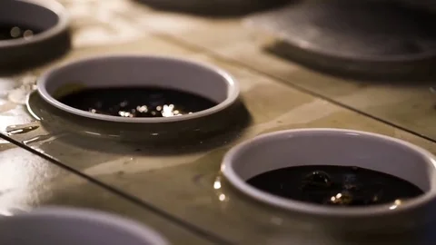 Automatic lid placement on a bucket filled with syrup Stock Footage 72559052