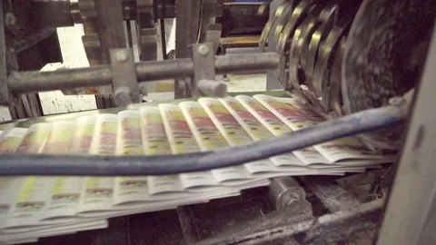 Automatic line with moving newspapers on machine in printing house Stock Footage 71315996
