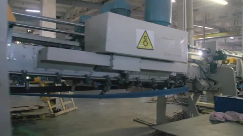 Automatic line for the production of cardboard boxes. Kraft paper products Stock Footage 232423993