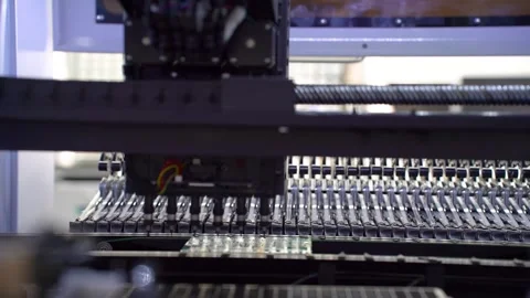 Automatic machine for assembling electronic circuit boards. Stock Footage 297561031