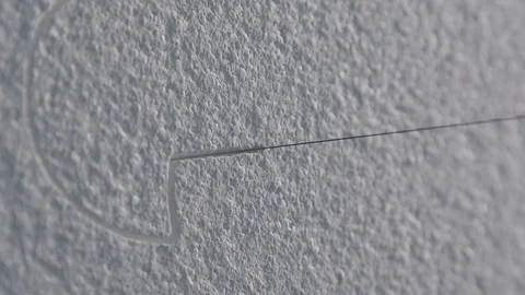 Automatic machine for cutting. Close up: Cutting plastic foam Stock Footage 73936174