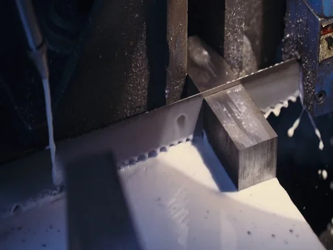 Automatic machine cutting of metal material, saw, liquid cooling. Stock Footage