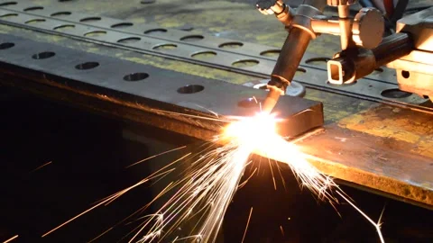 Automatic machine flame oxygen cutting process in iron workshop Stock Footage 148035125