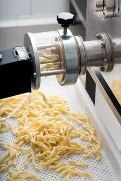 Automatic machine for making fresh pasta Stock Photos