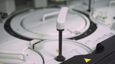 Automatic machine with medical laboratory test tubes Stock Footage 140975752