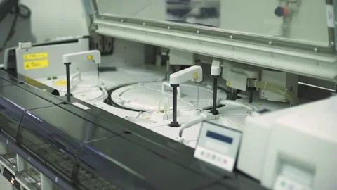 Automatic machine with medical laboratory test tubes Stock Footage 140976302