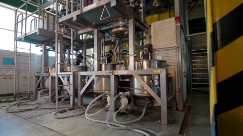 Automatic Machine Production of glue for laminate Stock Footage 63456637