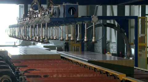 Automatic machine puts sandwich panel in pile Stock Footage 58752074