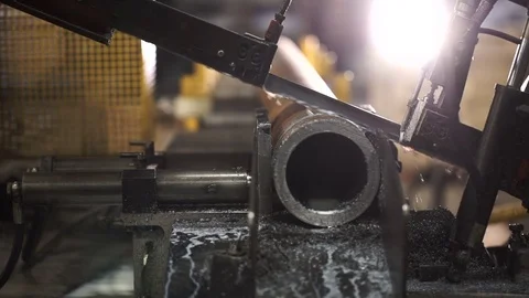 Automatic machine saws metal pipe Stock Footage 71505787