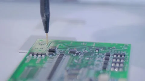 Automatic manipulator with dispenser needle during work with SMT pcb - close up Stock Footage 145151626