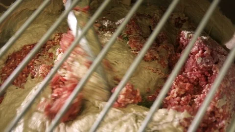 Automatic meat grinder for mixing minced ingredients Stock Footage 105080775