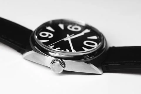 Automatic mechanical wrist watch with bold white numerals on black clock face Stock Photos