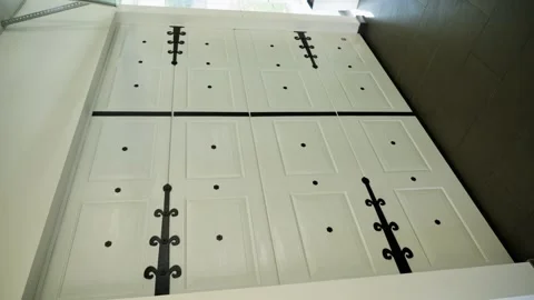 Automatic metal garage doors with added decor. Safety, reliability and elegance. 스톡 동영상 343529702
