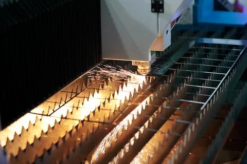 Automatic metal sheet cutting process Stock Photos