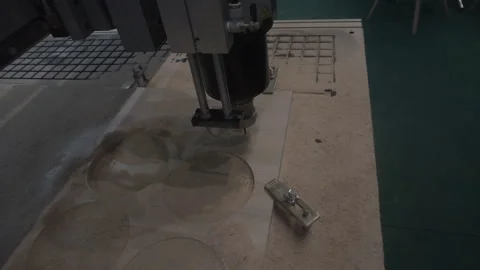 An automatic milling machine makes a lion-shaped wood pattern. Stock Footage 120872068