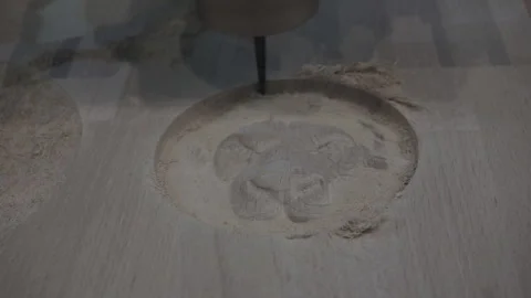 An automatic milling machine makes a lion-shaped wood pattern. Stock Footage 120872095
