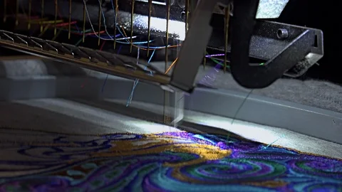 Automatic modern sewing machine embroider a pattern Stock Footage 95498410