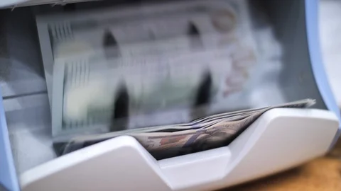 Automatic money counting machine close up Stock Footage 117056967