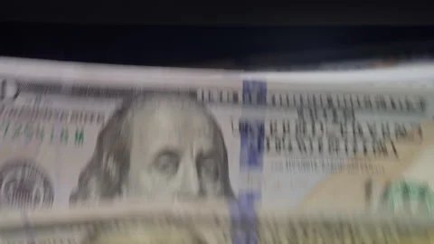 Automatic money counting machine processes US dollar banknotes for business Stock Footage 340025705