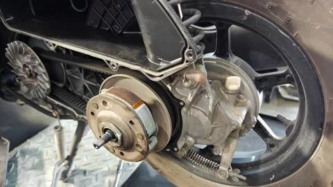 Automatic Motorcycle CVT Transmission System with Open Cover for Maintenance Stockfoto's