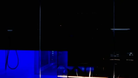 Automatic Motorized Rolling Shutter in an Illuminated Beautiful Bathroom Stockbeeldmateriaal 165201341