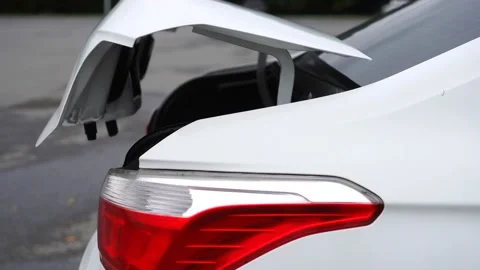 Automatic opening of the trunk of the car Stock Footage