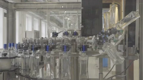 Automatic operation of the beverage filling conveyor. Stock Footage 163207341