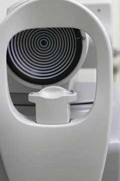 Automatic ophthalmic device for vision testing and eye measurements in a mode Stock Photos