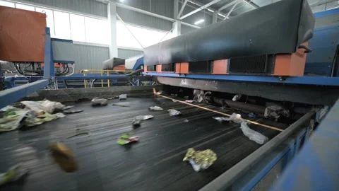 Automatic opto-pneumatic garbage sorting machine. Stock Footage 147635900