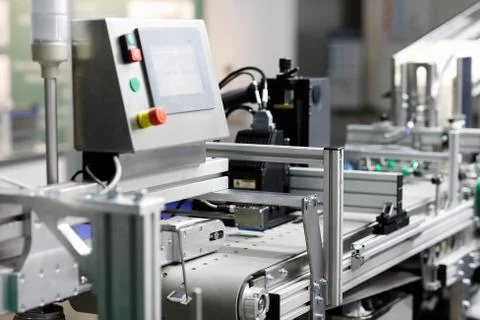 Automatic packaging belted conveyor system Stock Photos