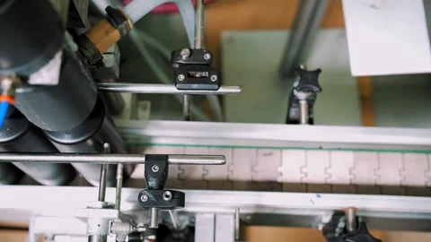 Automatic packaging of cosmetics. Cosmetic manufacturing process. Cosmetic Stock Footage 247005071