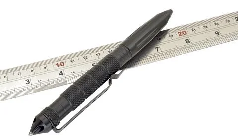 Automatic pencil and metal line on a white Stock Photos