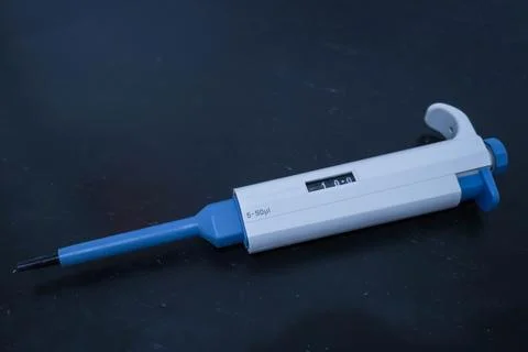 Automatic pipette, Micro pipettes, Micro chemical equipment laboratory Isol.. Stock Photos