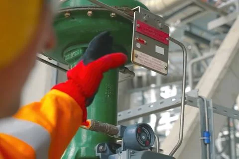 Automatic pneumatic valve to control gate valve on the pipeline. Stock Photos