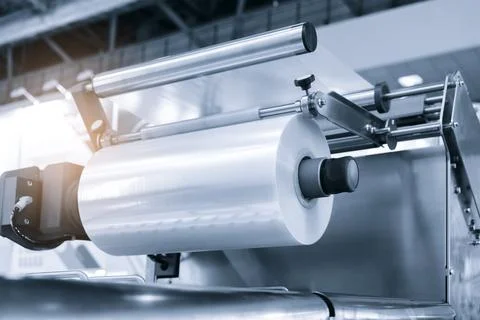 Automatic polyethylene plastic bag production machine with lighting effect. C Foto stock
