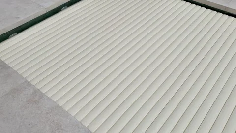 Automatic pool cover system retracting over water Stock-Footage 344987297