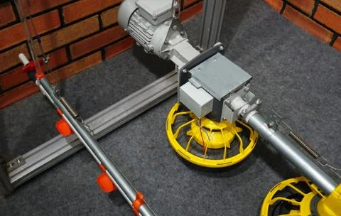 Automatic Poultry Feeding Machine In Caged Rearing Chicken Farm. Stock Photos