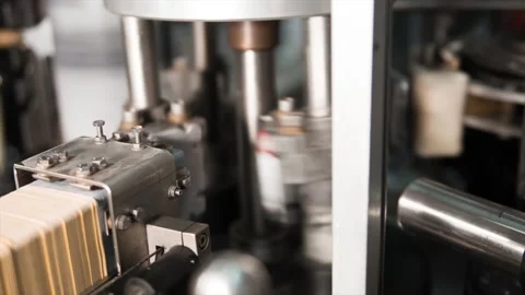 Automatic process of gluing labels on glass bottles. Stock Footage 88998436