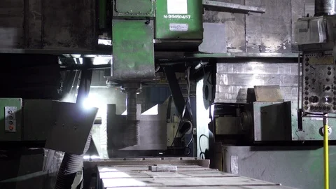 Automatic processing of metal products at the electrode factory. Production hall Stock Footage 116230554