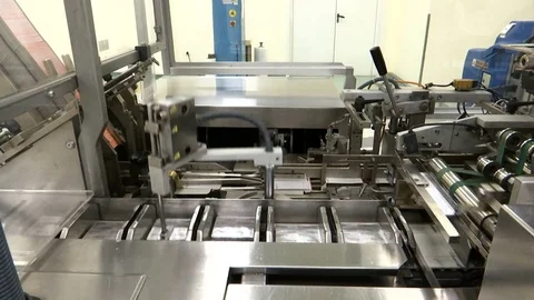 Automatic product packaging machine Stock Footage 81036754