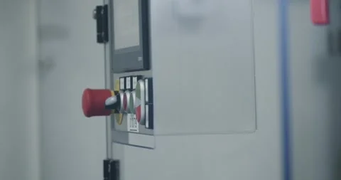 Automatic production line. Work gloves adjusts the settings of the machine. Stock Footage 245685782