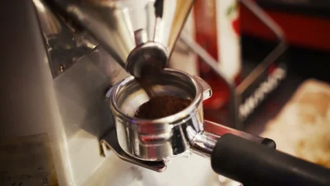 Automatic, professional machine grinding Coffee Beans, close up, soft focus Video stock 168237702