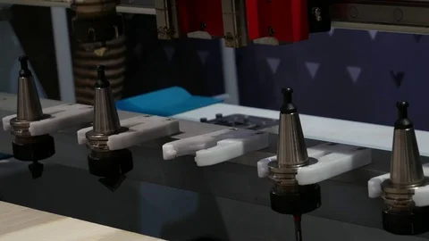 Automatic replacement of the milling head on the engraving machine Stock Footage 90395752